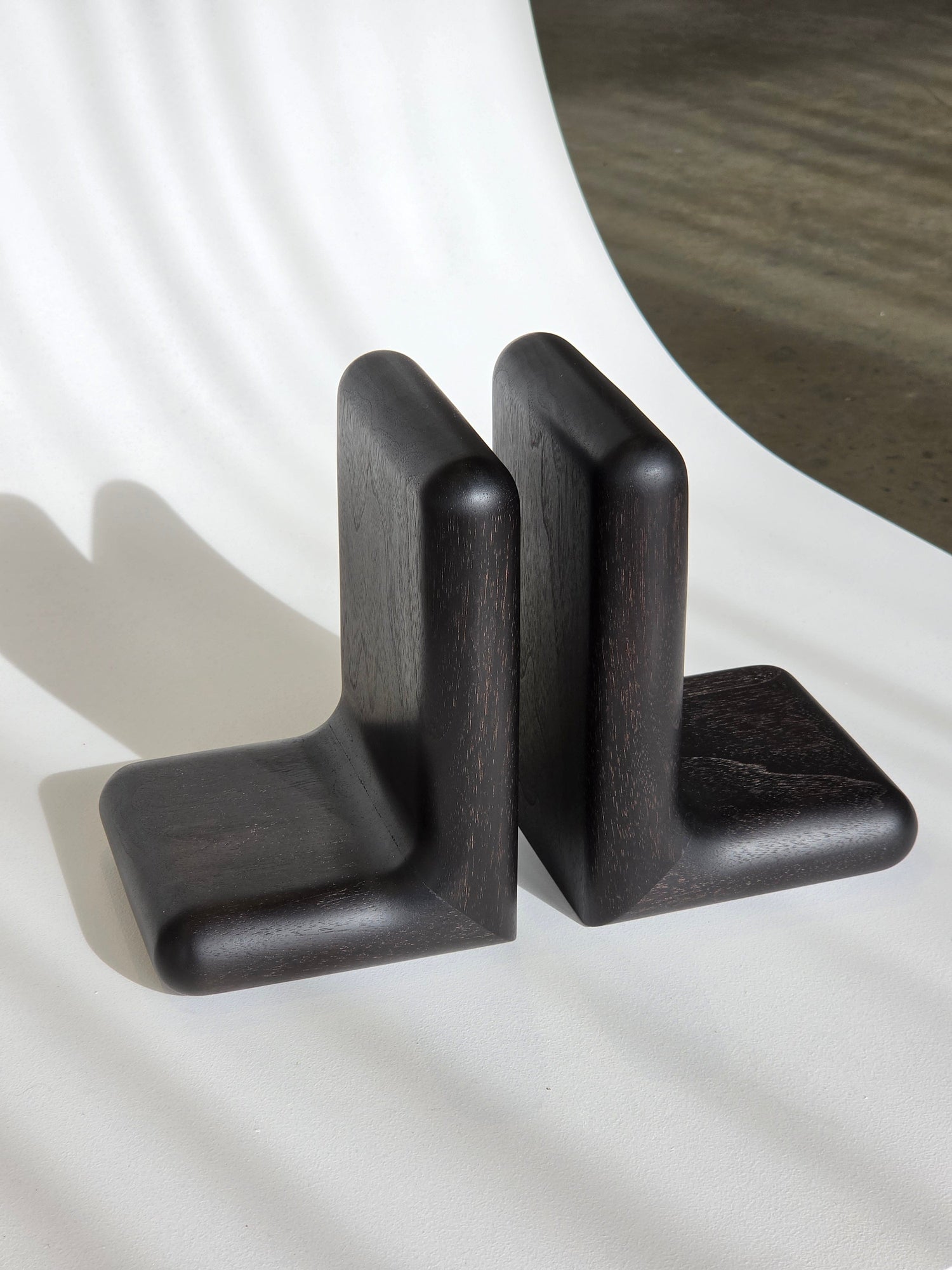 Hippo book ends in ebonised Jarrah, handcrafted by Nathan Day Design