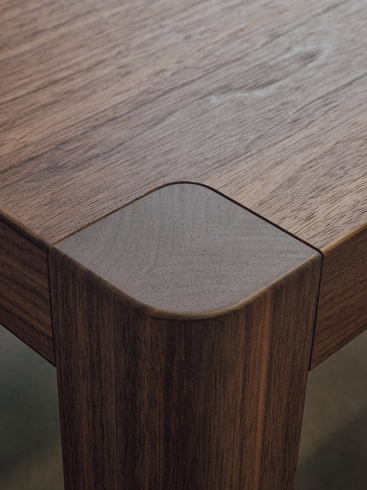 Irvine Dining Table in American Walnut with torsion box construction by Nathan Day Design – alternate view
