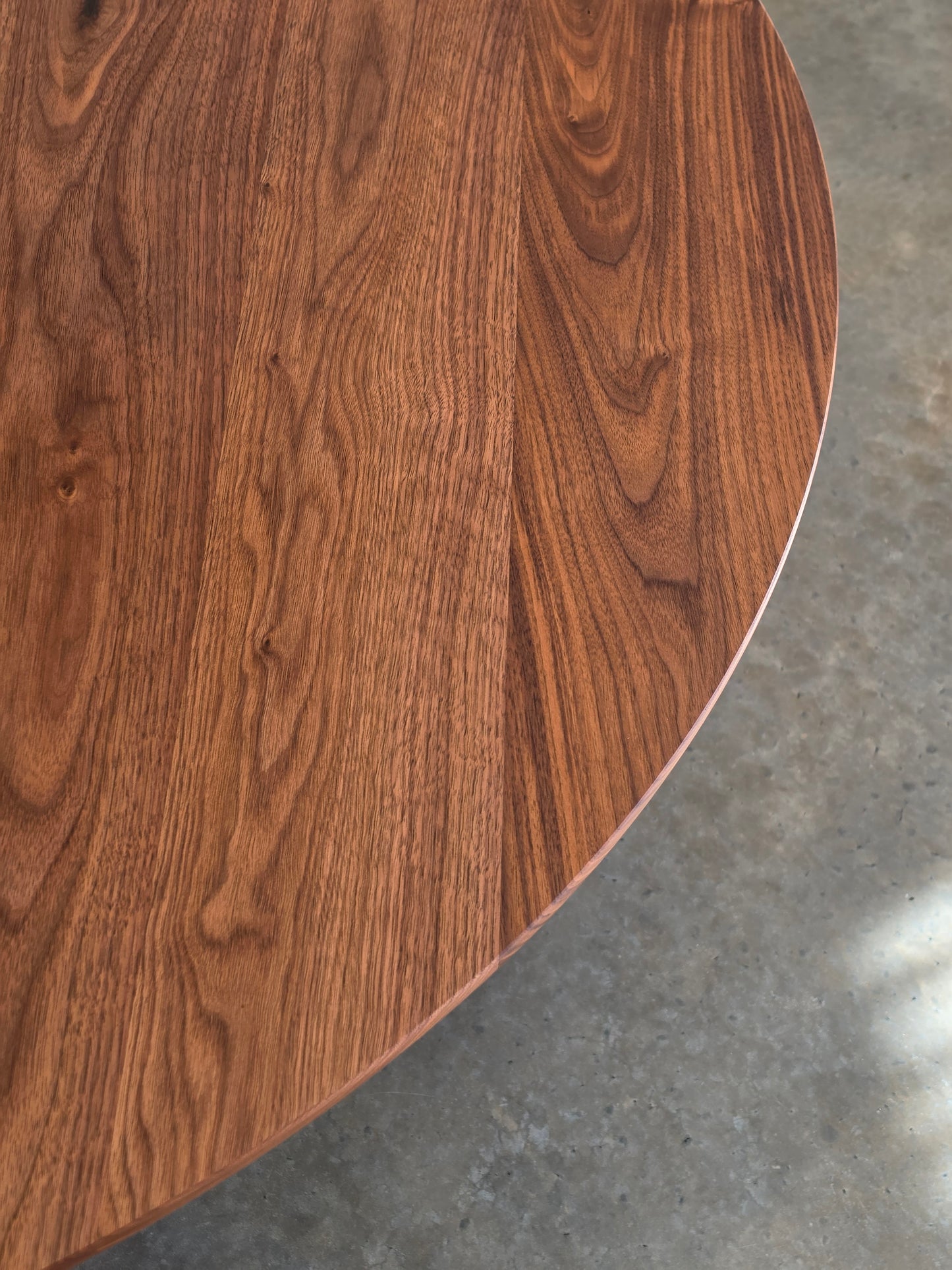 Boundary Lane round dining table in solid timber by Nathan Day Design – alternate view