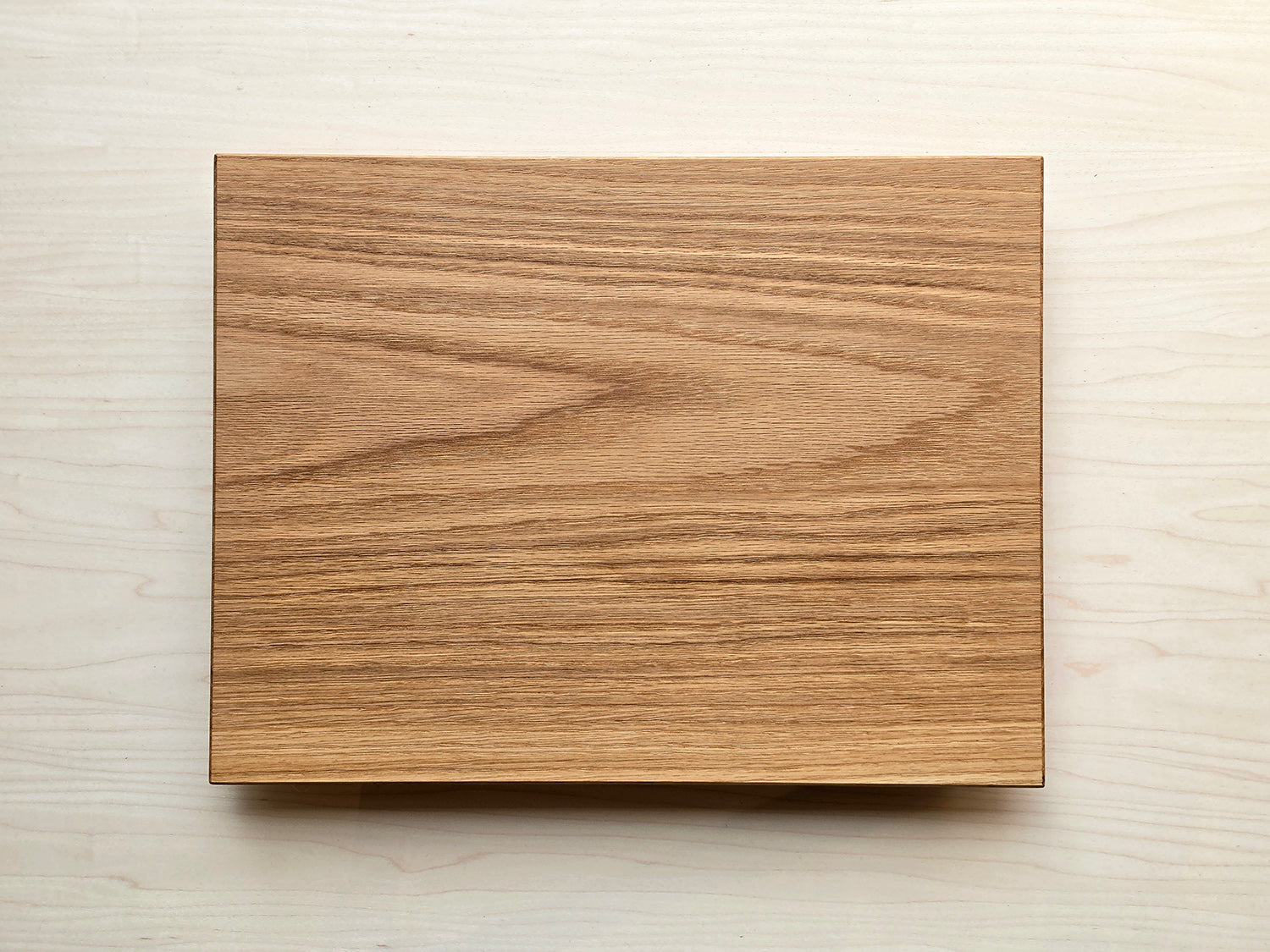 Bevelled Cutting Board in Oak by Nathan Day Design