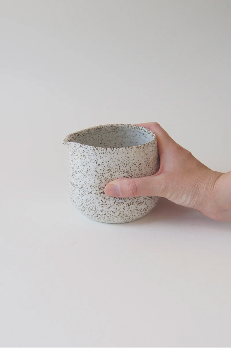 Handmade stoneware gravy pourer with dimpled grip by Kura Studio, Australian ceramics – view 4