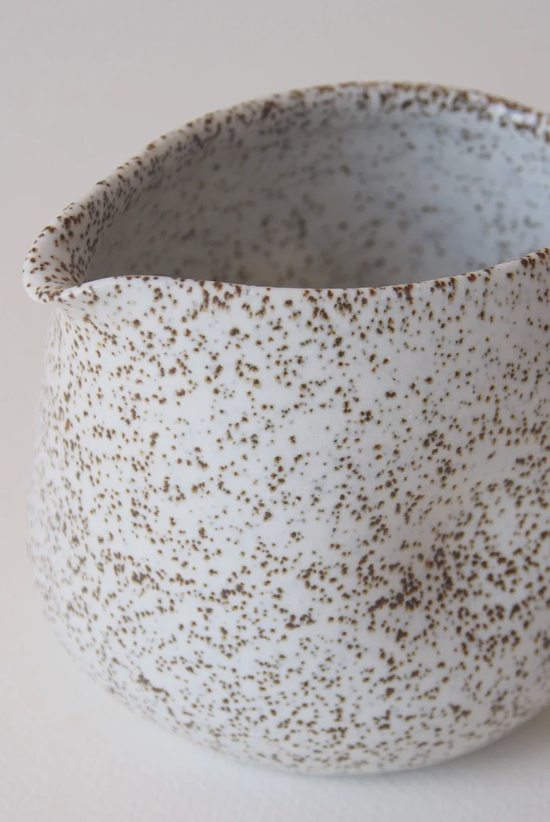 Handmade stoneware gravy pourer with dimpled grip by Kura Studio, Australian ceramics – alternate view